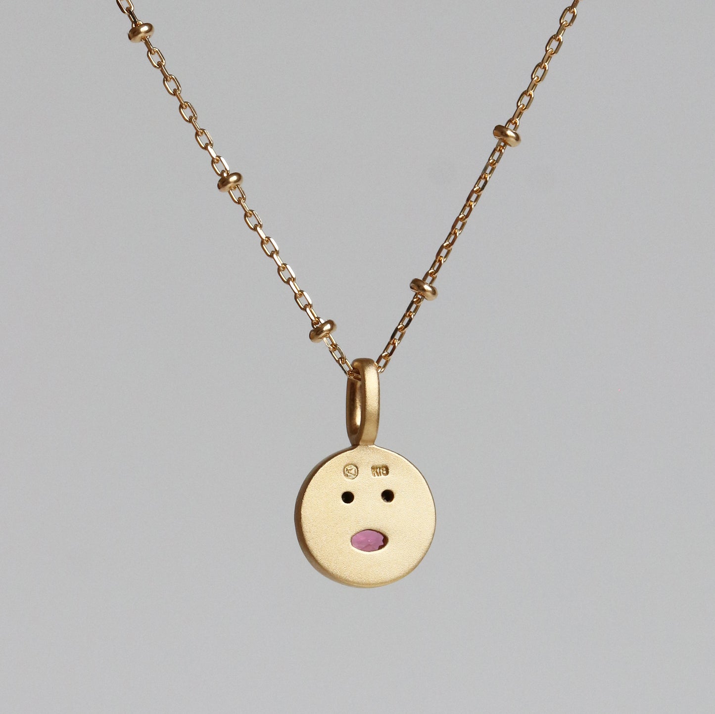 PETITE OVAL SMILE CHARM