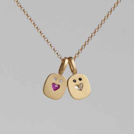 REVERSIBLE HEART SMILE CHARM
