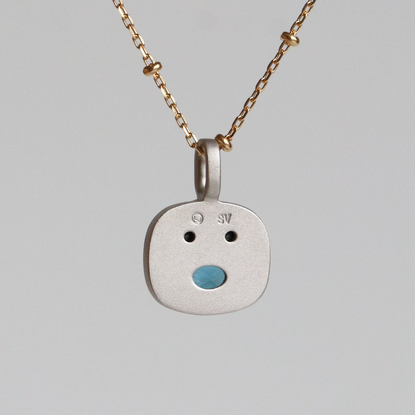 OVAL SMILE CHARM