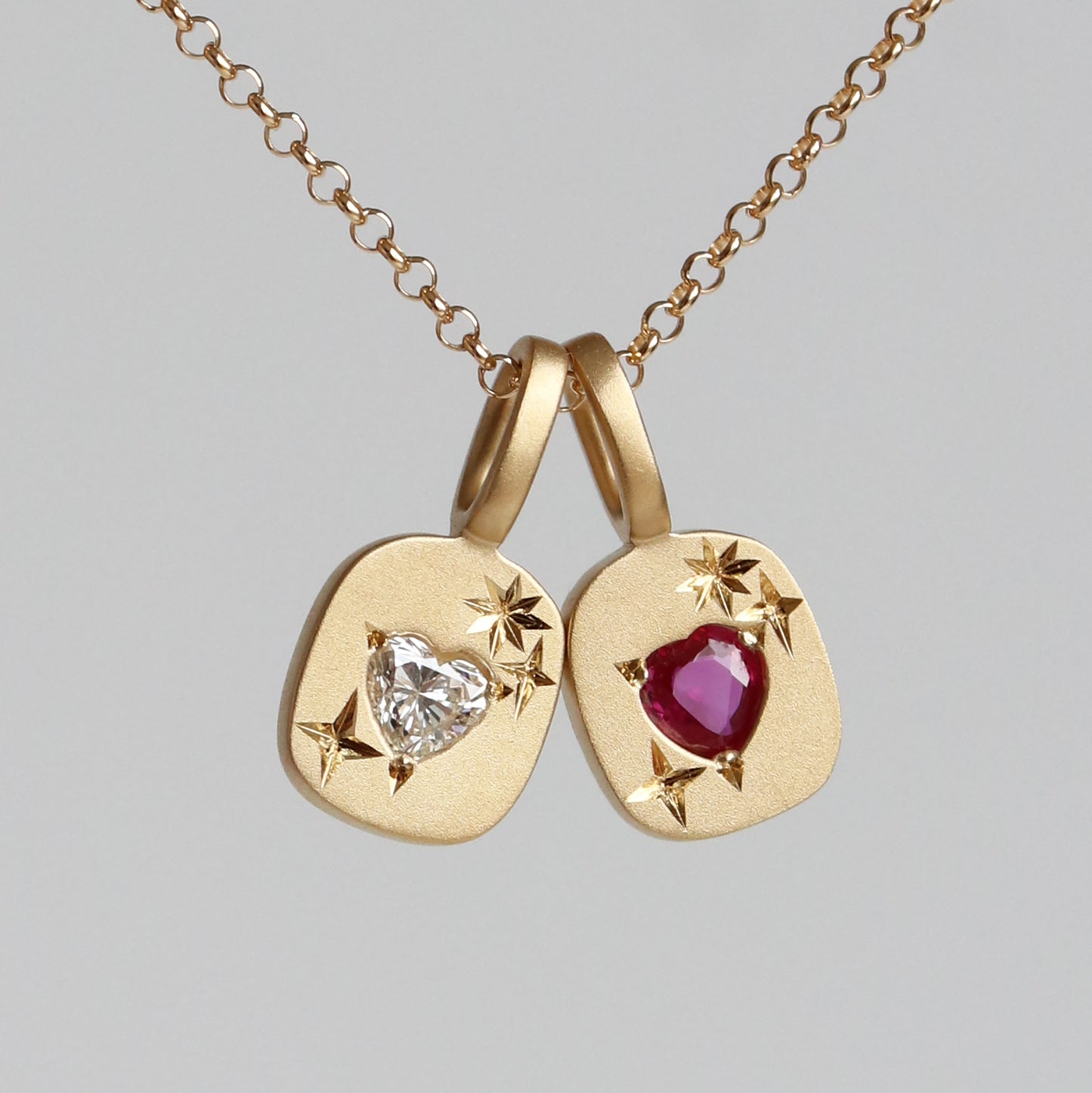 REVERSIBLE HEART SMILE CHARM