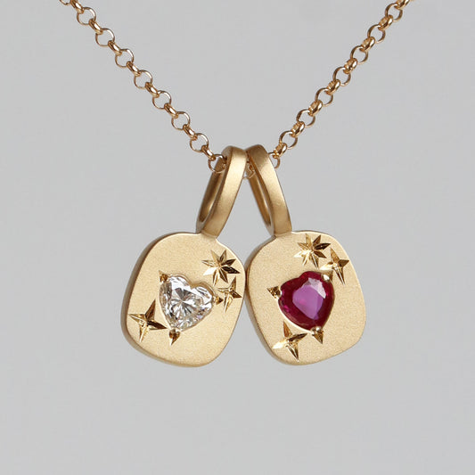 REVERSIBLE HEART SMILE CHARM