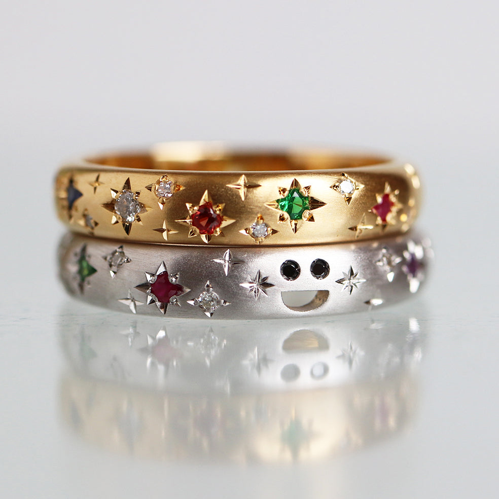KOMI Tiny Smile Multi Colored Band ring handcrafted in 18k gold and sterling silver, featuring vibrant multi-colored gemstones and a tiny smile motif.